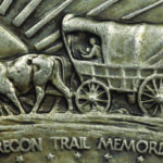 Close-up of counterfeit 1928 Oregon Trail half dollar