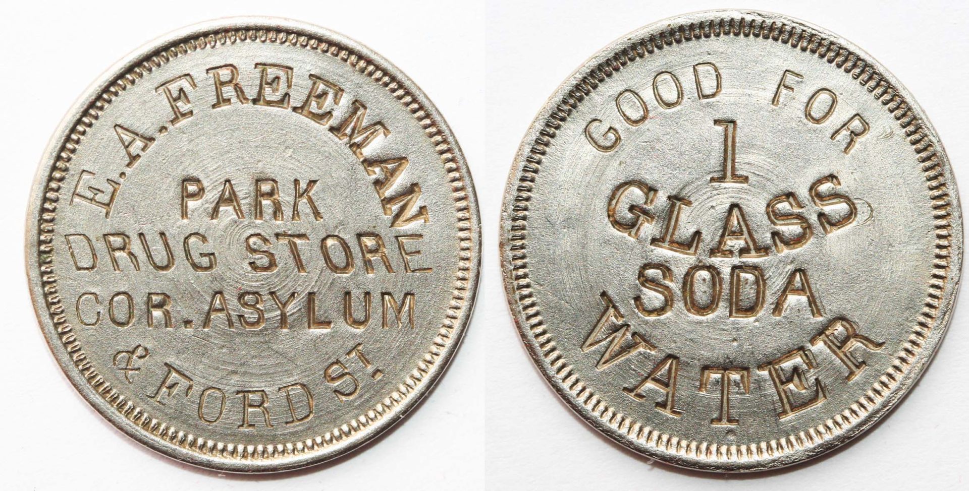 Freeman's trade tokens for his drug store