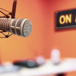 A podcast mic in a recording studio