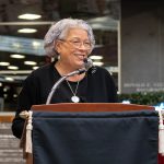 Ventris C. Gibson speaking at a podium.