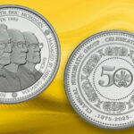 The CNG 50th anniversary medal against a yellow background