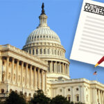 A pen and letter beside a photo of the U.S. Capitol building