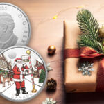 The Royal Canadian Mint Santa Claus coin beside a wrapped Christmas gift.