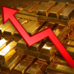 Piles of gold bars with an upwards red arrow